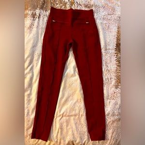 Deep red pants very form fitting to add to your closet!